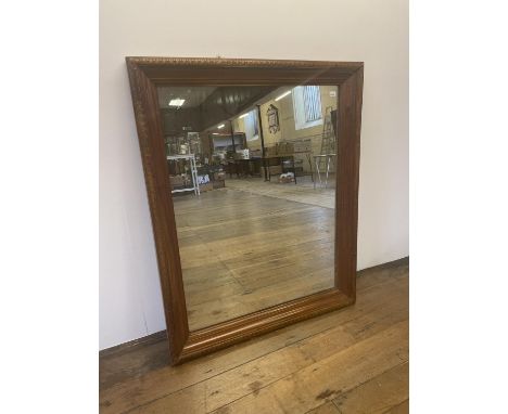 A walnut framed wall mirror, 113 x 92 cm 