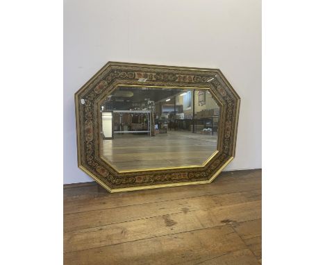 A gilt framed wall mirror, decorated flowers, 90 x 120 cm 