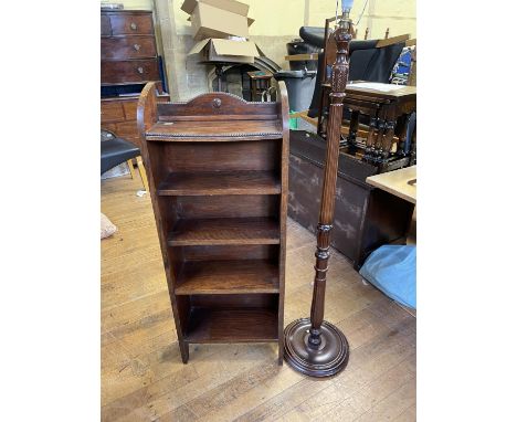 An oak glazed bookcase, 61 cm wide, two other bookcases, an oak drop leaf table, an oak tray, a shelf, a standard lamp and a 