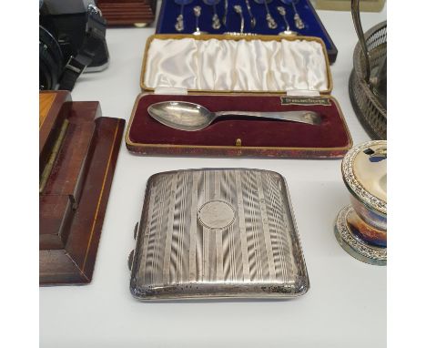 A silver cigarette case, a set of silver spoons, a book slide, two clocks and other items (box) 