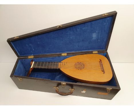 An 8 course lute, made by Anthony S Campbell, with carrying case 