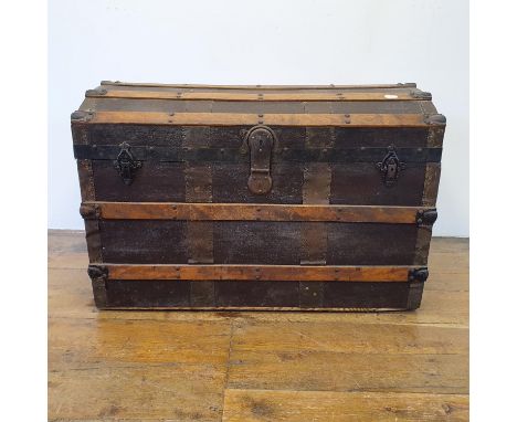 A canvas and oak dome top trunk, 85 cm wide, and a mahogany chest, 107 cm wide (2) 