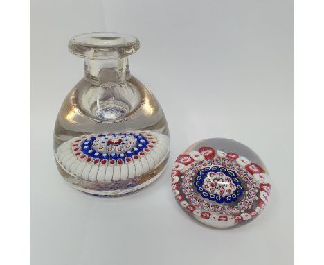 A glass milleflori paperweight, 7 cm diameter, and a similar inkwell, cracked (2) 