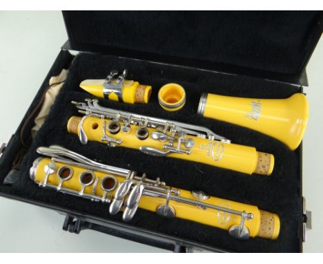 VITO RESO-TONE 3 CLARINET, ser. no. F4xxx8, apricot coloured 'Dazzler' version, in fitted case. Condition: very good overall