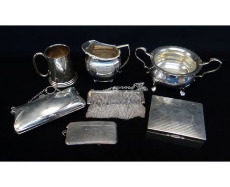 ASSORTED SILVER ITEMS, including milk jug, Christening mug, sugar basin with loop handles, calling card case, evening purse w