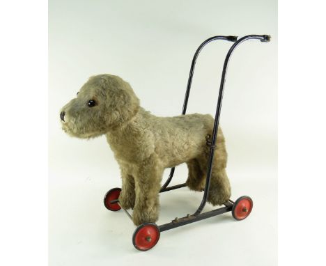 BBC BARGAIN HUNT LOT:&nbsp;VINTAGE MERRYTHOUGHT GREY PUSH ALONG DOG, on original painted metal frame, with metal and rubber w