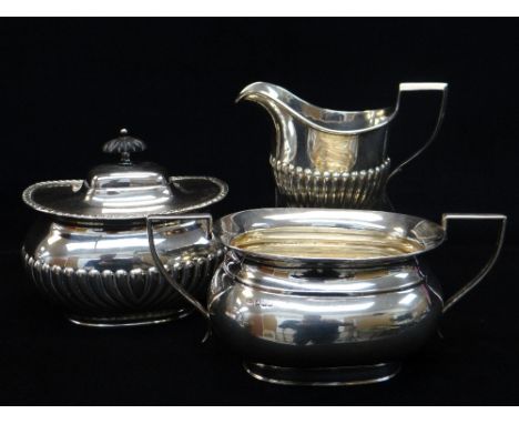 SILVER MILK JUG, SILVER SUGAR BASIN and PLATED TEA CADDY, fluted jug Chester 1919, plain basin Sheffield 1919, tot. appr. wt.