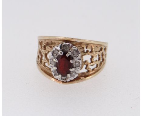 9CT GOLD GARNET &amp; DIAMOND CLUSTER RING of openwork design, ring size L / M, 4.5gms