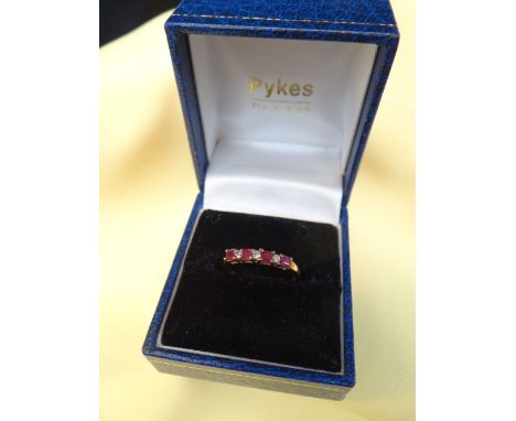 9CT GOLD RUBY &amp; DIAMOND SEVEN STONE RING, ring size M, 1.3gms, in square blue ring box Condition: appears in good overall