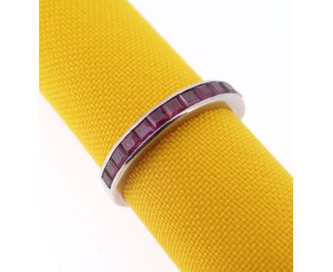 18CT WHITE GOLD RUBY HALF ETERNITY RING, ring size N, 3.1gms, in square brown ring box Condition: appears in good overall con