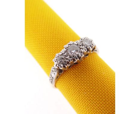 18CT GOLD &amp; PLATINUM THREE STONE DIAMOND RING, the illusion set diamonds 0.16ct overall approximately, ring size M / N, 3