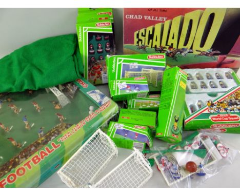 QUANTITY OF VINTAGE SUBBUTEO to include International football set, together with various Subbuteo goal keepers etc.