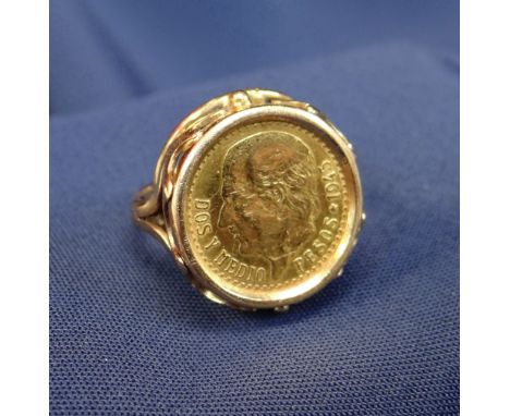 18CT GOLD RING set with 1945 'Dos Y Medio' (2 1/2) peso coin, ring size J, 5.6gms Condition: surface wear and light scratches