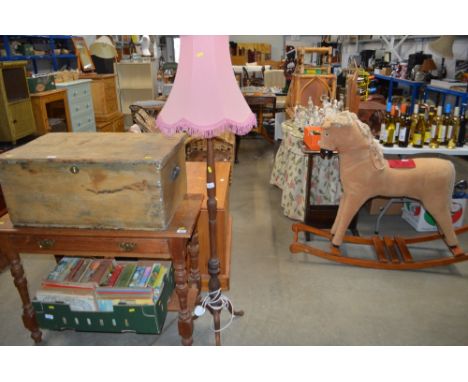 A mahogany standard lamp and shade