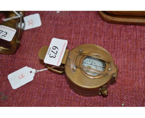 A reproduction brass cased compass (37)