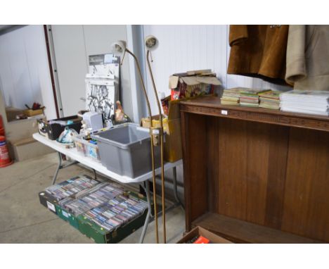 A brass adjustable floor standing reading lamp