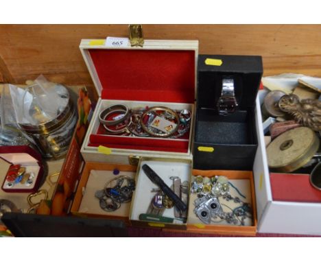 A box containing various costume jewellery; pen knife and pen; wrist watch etc