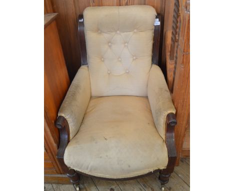 A late Victorian Mahogany button backed armchair