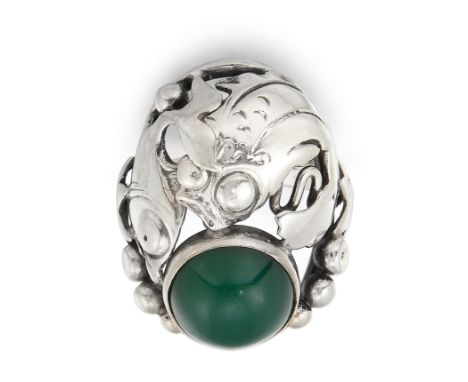 NIELS ERIK FROM - A DANISH SILVER CHRYSOPRASE RING, a round cabochon chrysoprase within a pierced frame decorated with fish a