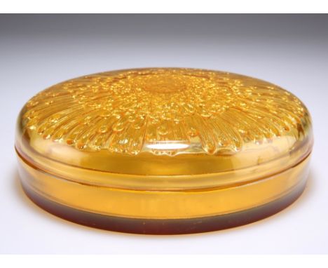 RENE LALIQUE"TOKIO", A LIDDED BOX, designed 1921, amber glass, moulded LALIQUE mark. 17cm diameterThe absence of a Condition 