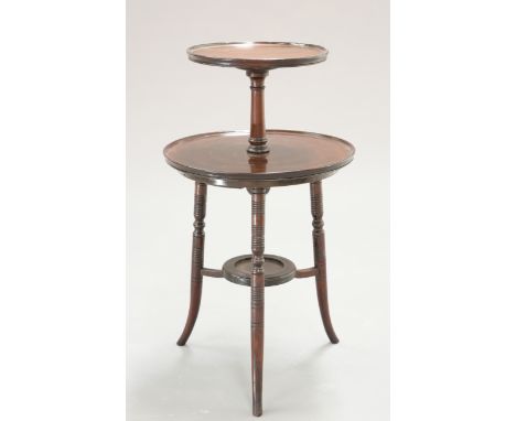 ATTRIBUTED TO EW GODWINA AESTHETIC MOVEMENT MAHOGANY DUMBWAITER, C.1890, the two circular tiers raised on ring turned and spl