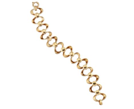 A 9CT GOLD ABSTRACT BRACELET, CIRCA 1970s, designed as off-set oval hoop links alternating with button links, hallmarked impo