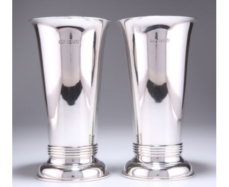 A PAIR OF ARTS AND CRAFTS SILVER VASES, by Ollivant & Botsford, London 1909, tapering cylindrical with slightly out-turned ri