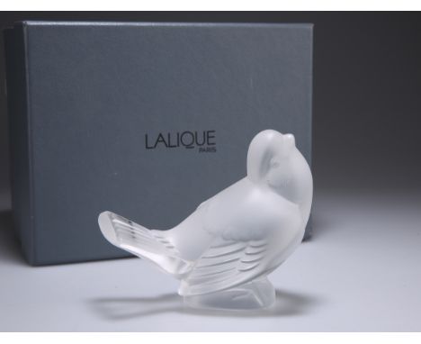 LALIQUE, A MODEL OF A SPARROW, clear glass, inscribed Lalique France to base and with Lalique sticker. Measures 9cm high, in 