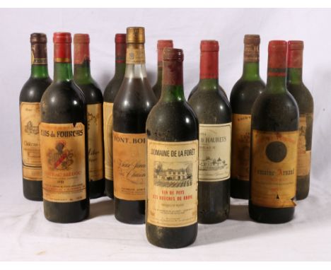 Twelve bottles of vintage wine including CHATEAU CLERC MILON cru classe Baron Philippe de Rothschild Pauillac, CHATEAU DE SEG