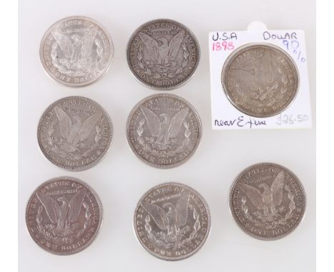 UNITED STATES OF AMERICA USA eight silver Morgan dollars including 1886, 1897, 1898,1921 (3), 1921 D (2) .