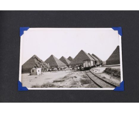 Two albums and loose photographs and postcards to include many of HMS Calcutta, also HMS Lowestoft, South African mine sweepi