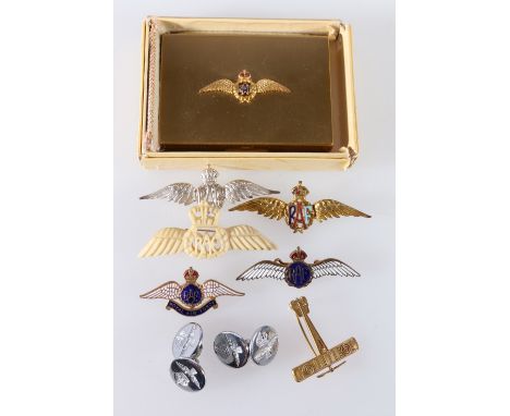 Vogue compact with RAF ensignia and various RAF sweetheart brooches, one silver, one carved bone also an aeroplane brooch.