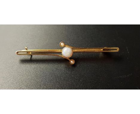 PRETTY OPAL AND SEED PEARL BAR BROOCHin nine carat gold, the central round cabochon opal with seed pearl above and below, 4.9