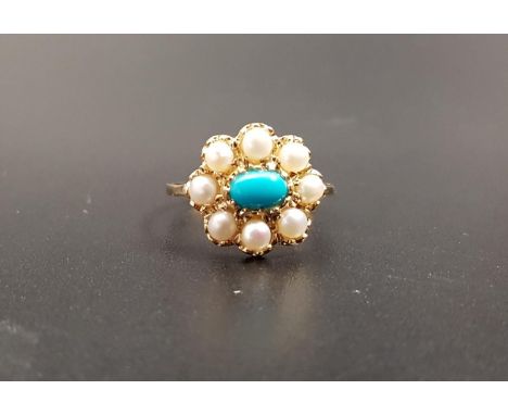 TURQUOISE AND SEED PEARL CLUSTER RINGthe central oval cabochon turquoise in eight pearl surround, on nine carat gold shank, r