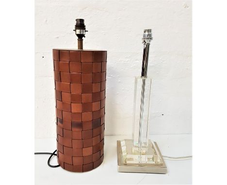 ART DECO STYLE TABLE LAMPraised on a square metal base with a resin step and resin column, 44cm high, together with a cylindr