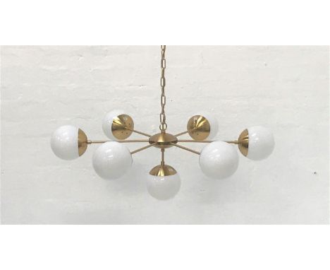 SIX BRANCH PENDANT LIGHTwith opaque circular glass shades and brass effect suspension chain, and with additional lower drop p