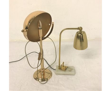 BRASS DESK LAMPwith adjustable shade and raised on a rectangular marble plinth, 46cm high; together with a brass lamp with ad