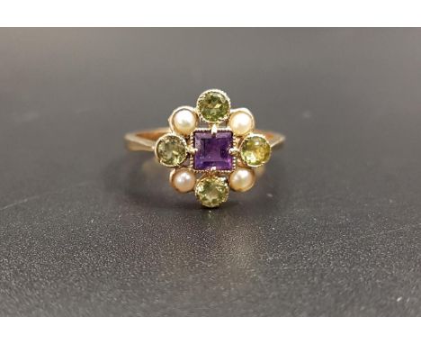 PRETTY 'SUFFRAGETTE' RINGthe central amethyst in peridot and pearl surround representing the colours of the suffragettes, on 