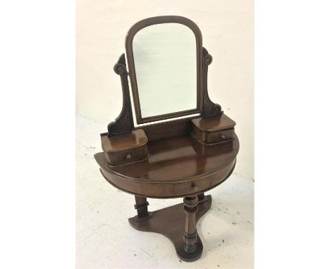 VICTORIAN MAHOGANY DUCHESS DRESSING TABLEwith a shaped mirror above two jewellery drawers and a shaped top with a central fri