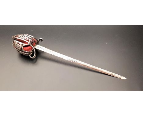 UNUSUAL GEORGE V SILVER LETTER OPENERby Hamilton & Inches, in the form of a Scottish basket hilted broadsword, the blade with