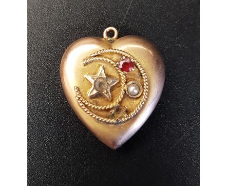 RED GEM AND SEED PEARL HEART SHAPED PENDANTin unmarked gold, decorated with star and crescent moon motifs, approximately 2.5 