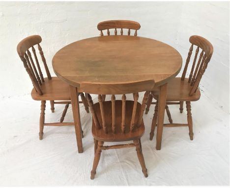CIRCULAR LIGHT OAK KITCHEN TABLEwith a broad frieze, standing on tapering supports, 105cm diameter, together with four pine f