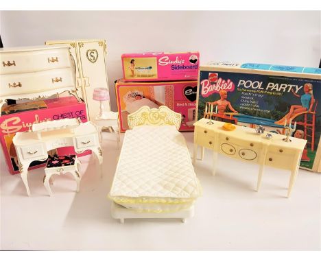 SELECTION OF 1970s SINDY FURNITURE comprising a boxed Bed & Bedclothes; a dressing table with stool; a wardrobe containing ha