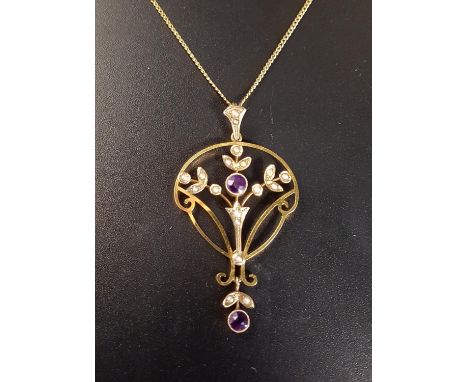 AMETHYST AND SEED PEARL HOLBEIN PENDANTin nine carat gold and on nine carat gold chain 
