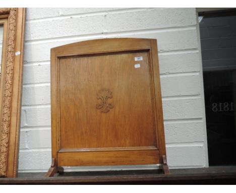 A golden oak firescreen