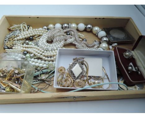 A selection of costume jewellery including necklaces, cufflinks etc