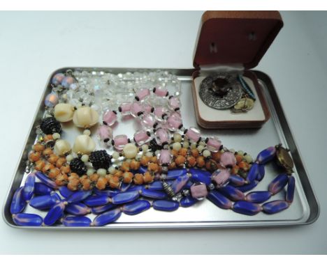 A small selection of vintage jewellery including bead necklaces, HM silver Scottish brooch, cufflinks etc