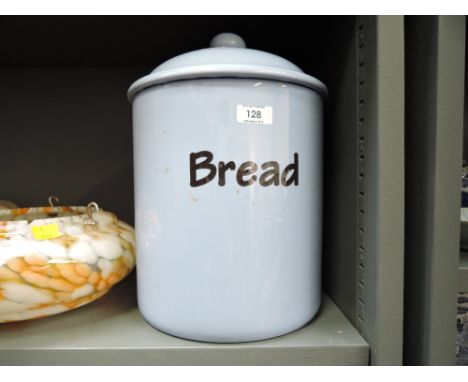 a large ceramic bread bin with blue glaze