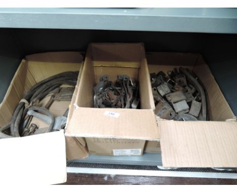 A selection of motor car and engine spare parts fixtures and fittings etc