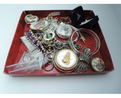 A small selection of costume jewellery including bangles, brooches, cufflinks, bracelet, repro Spit fire souvenir pocket watc